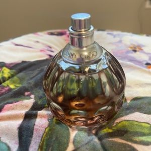 Used maybe twice. 3.3 ounce Jimmy Choo perfume
